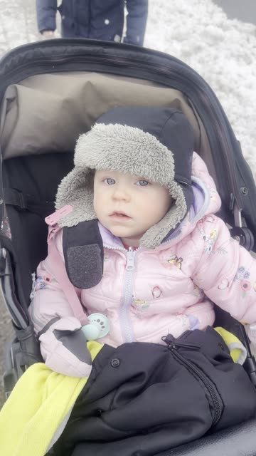 baby sticking out her tongue