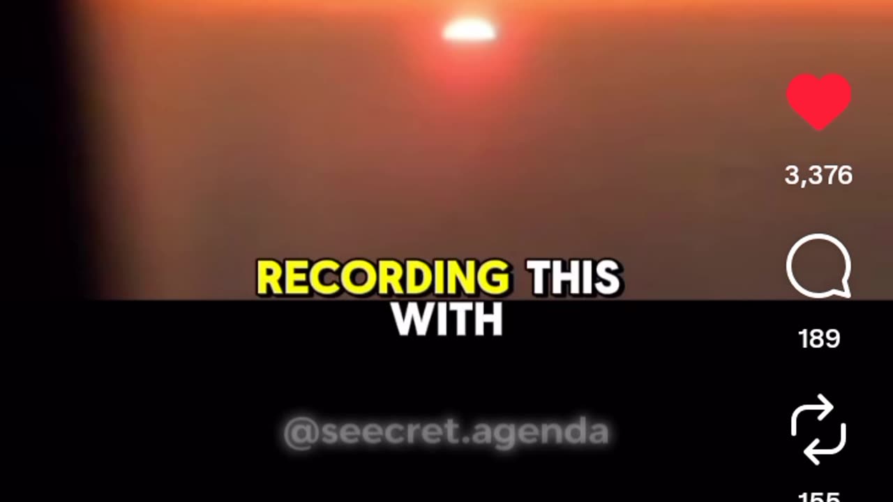 MAN FILMS SUN IN CLOUDS FROM PLANE