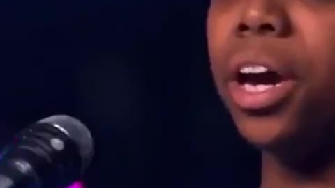 this will brighten your day...boy sings incredibly