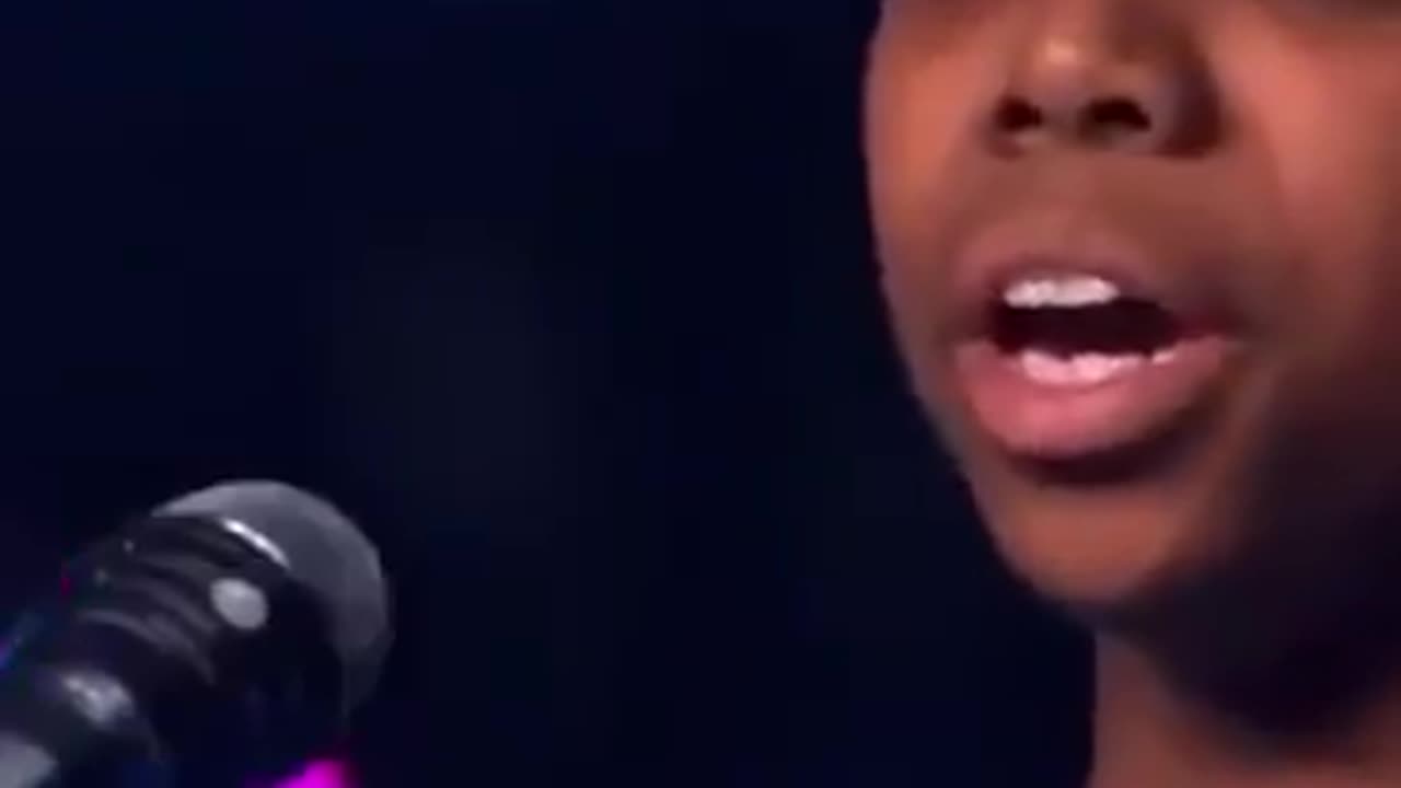 this will brighten your day...boy sings incredibly