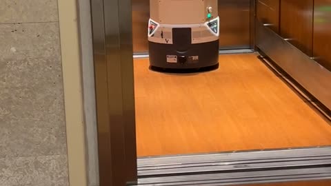 Hospital Robot Takes The Elevator