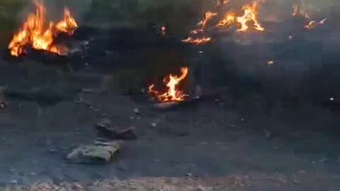 Russian Soldier Moving Through the Remains of Those Who Came Before