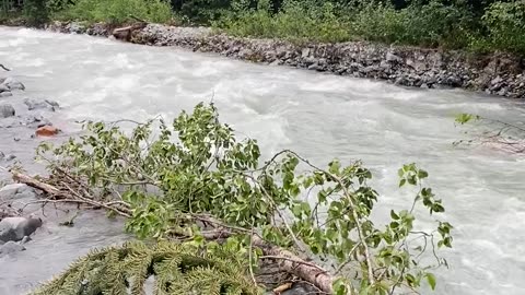 Crossing A River In The Arkhyz Mountains