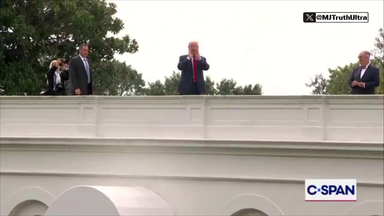 President Trump taking a stroll on top of the White House