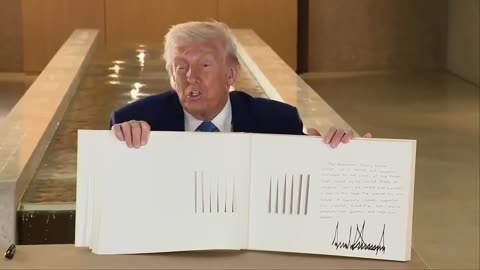 POTUS signs a guestbook at the Abrahamic Family House