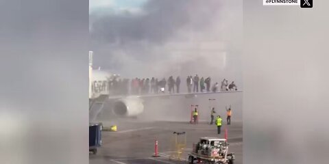 American Airlines plane catches fire moments after touch down