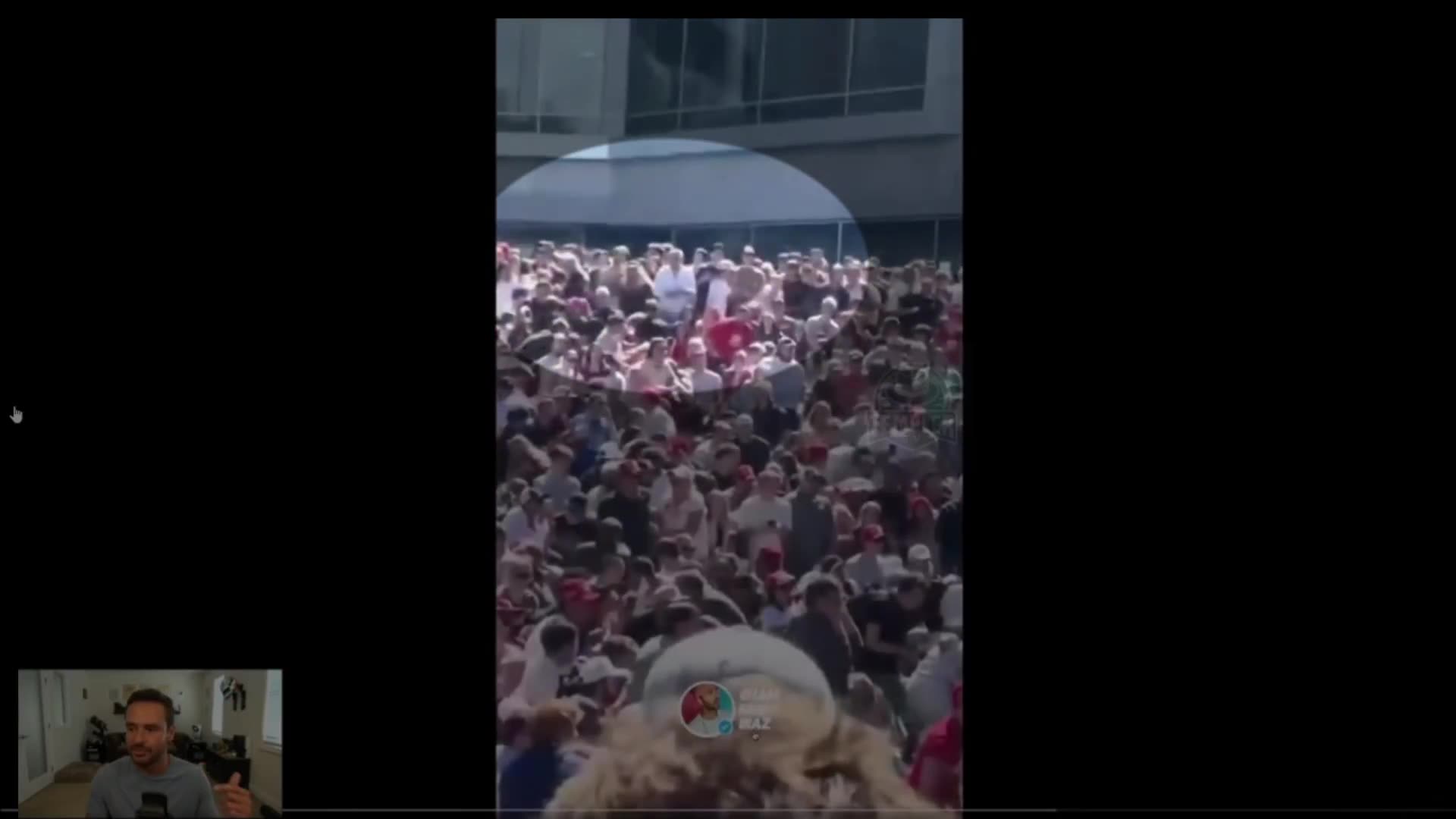 Weird hand gestures in the Charlie Kirk crowd