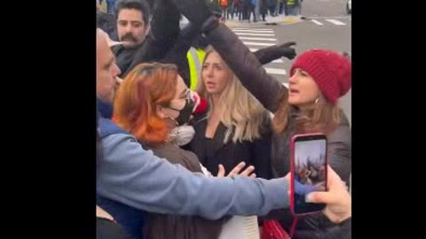 Iranian husbands have to hold back wives from beating down. White Pro-Hamas liberals Karen's harass Iranians at an anti-Islamic Regime rally in Washington State. Because nothing says moral narcissism like a white woman telling Iranian refugees that o