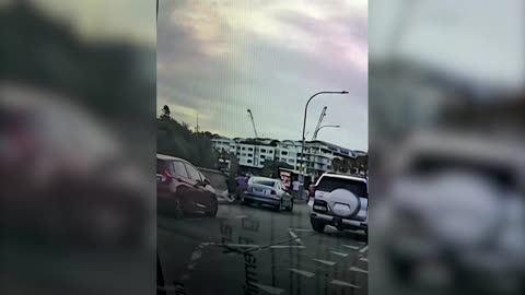 Dashcam captures moment man disarms Bondi shooter