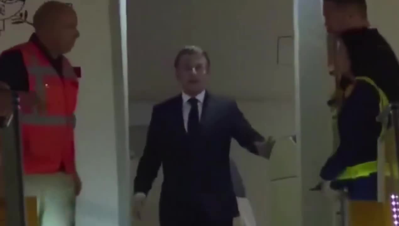 Emmanuel and Brigitte Macron arrive in Vietnam.