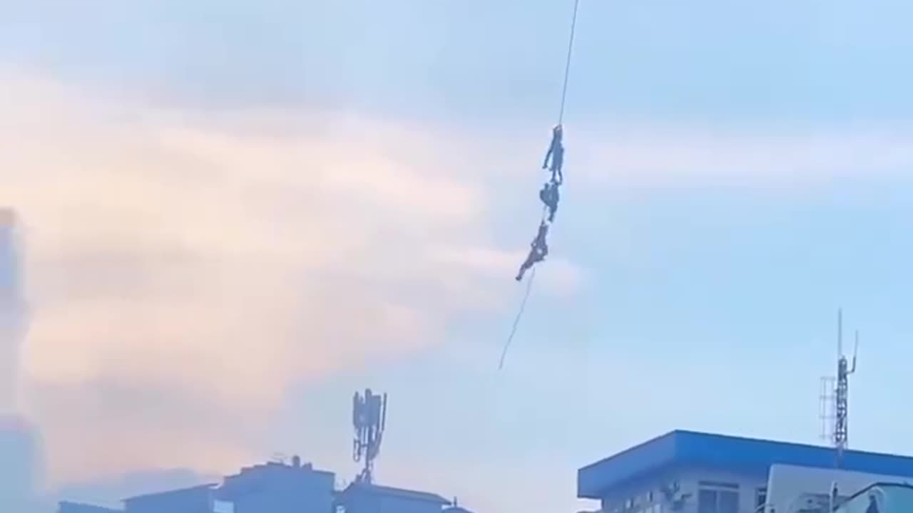 Nepal's MP ministers escaped by hanging from a helicopter rope.