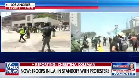 Rioters engaging with National Guard troops in LA