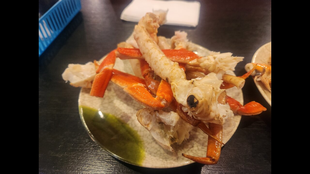 Eating Crab Legs at a seafood style buffet