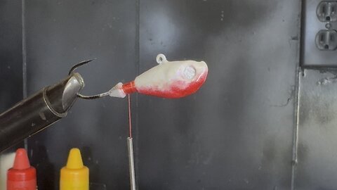 Bleeding shad bucktail