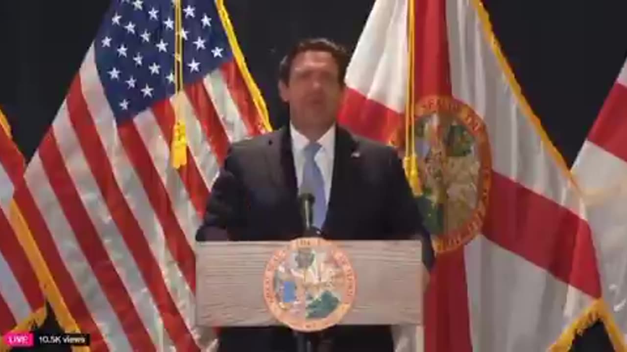 A protester interrupts Ron DeSantis at an event today: "Is that your fucking legacy? You bow down to a fucking pedophile! You're a fucking pedophile!"