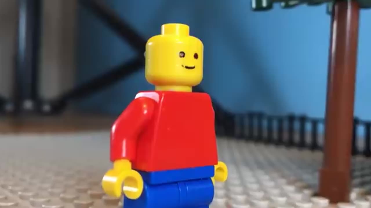 Lego Man steps on a Lego