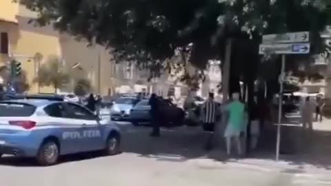 A North African man with a machete threatens Italian women and is run over by