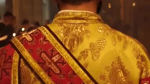 Armenian priests leading a procession in the Church of Holy Sepulchre, Jerusalem