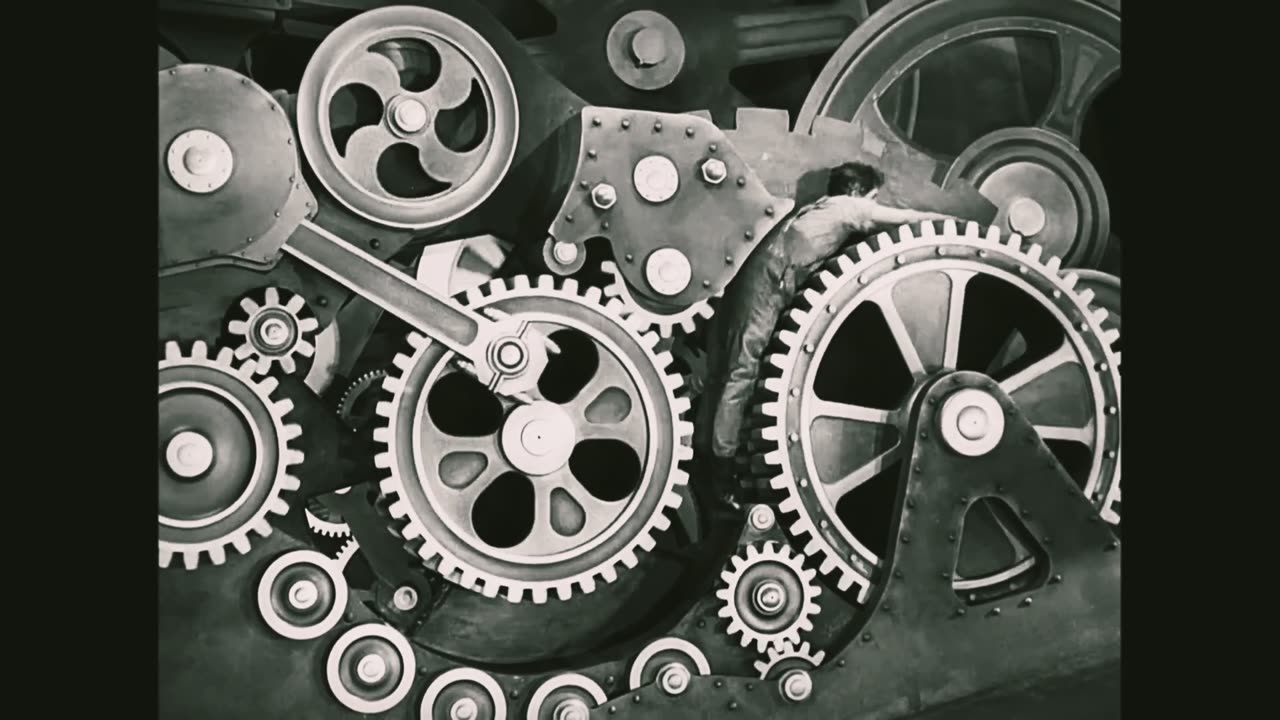 Charli chaplin swallowed by a Factory machine modern times