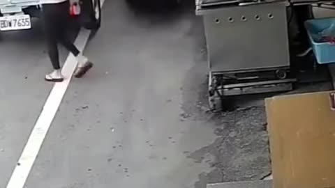 "Shocking Car Crash Near Truck – Narrow Escape Caught on Camera!"