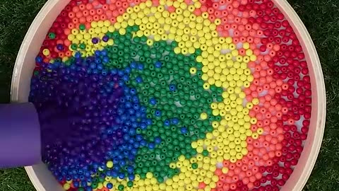 Watch colorful beads drop! Can you name each color?