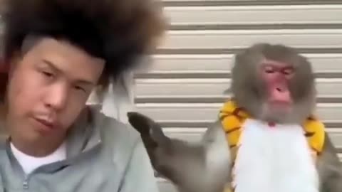 The girl's reaction to her new haircut
