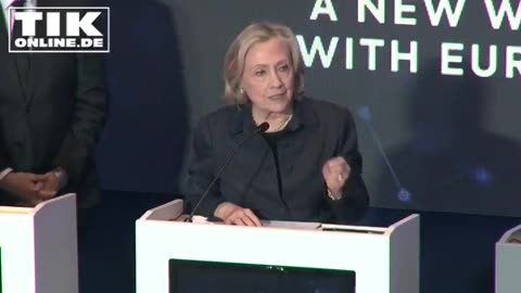 HILLARY CLINTON TRASHES AMERICA WHILE IN GERMANY.