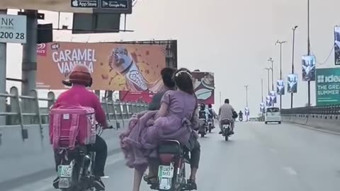 Bold & Beautiful: Pakistani Desi Woman in Western Dress Rides Bike with Partner! 🏍️💃🇵🇰
