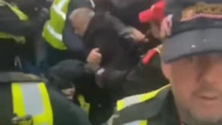 The British police try to stop march in London but fail and are overwhelmed by patriots.