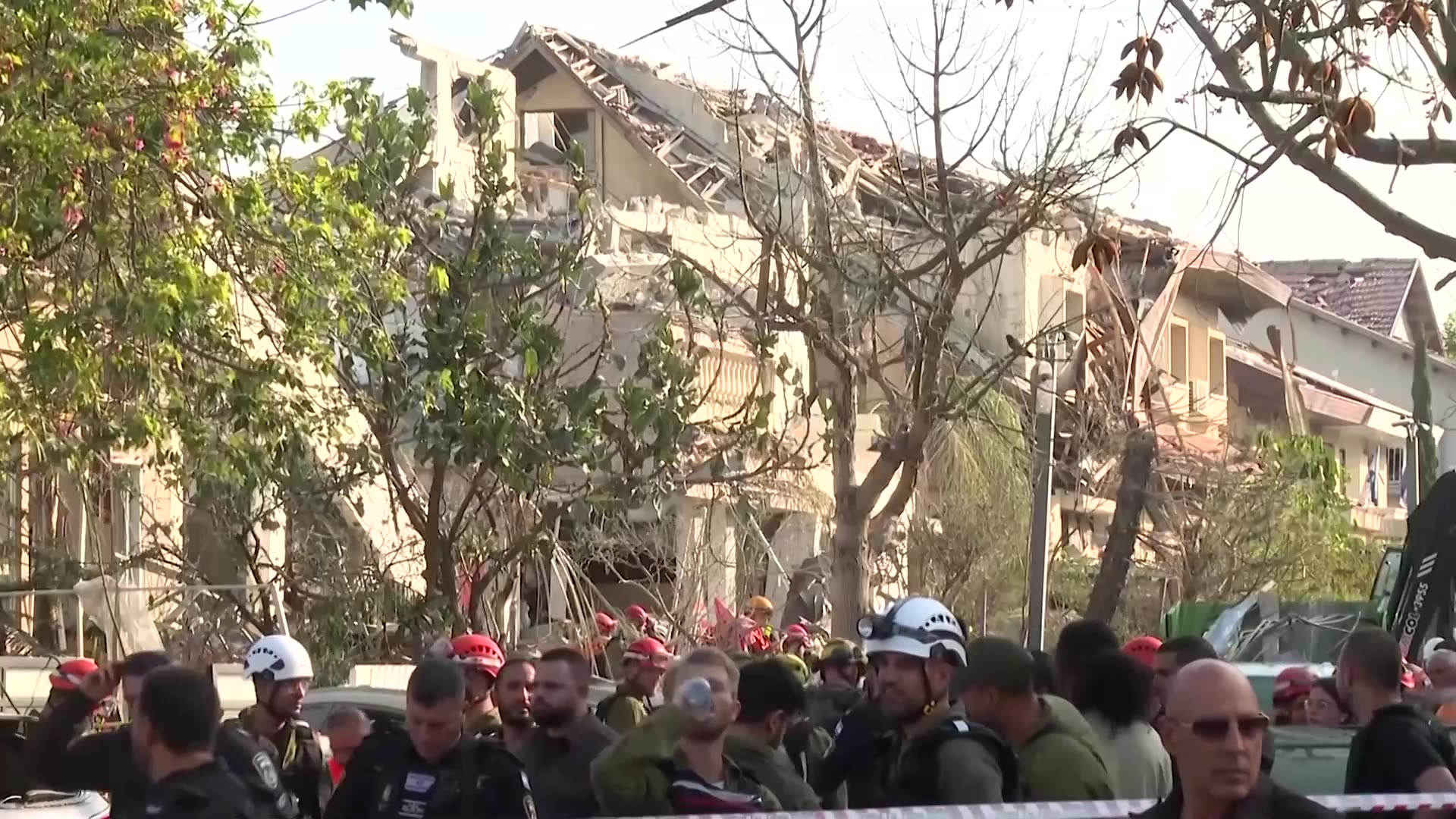 Rescuers evacuate Israel missile strike sites after Iran barrage