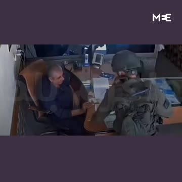 Israeli soldier storms office and removes Palestinian flag in West Bank - Middle East Eye