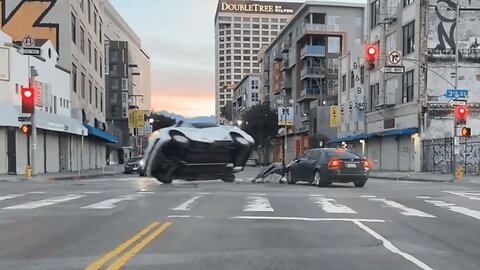 Car Runs Red Light And Flips a Van