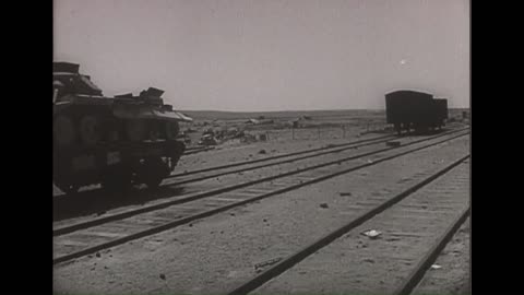 crusader tank wreck on a flatcar in tobruk in 1942