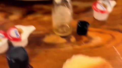 American goes to Cracker Barrel and shows that their biscuits are so hard he can actually smacks...