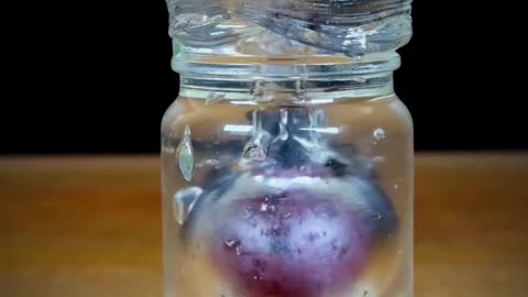 Dropping a Glowing Iron Ball on Ice