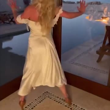 Britney Spears nearly spills out of white dress in deleted clip