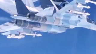 A Beriev A-50 under the protection of a Su-35s