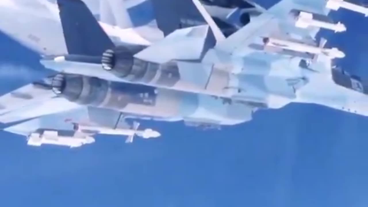 A Beriev A-50 under the protection of a Su-35s