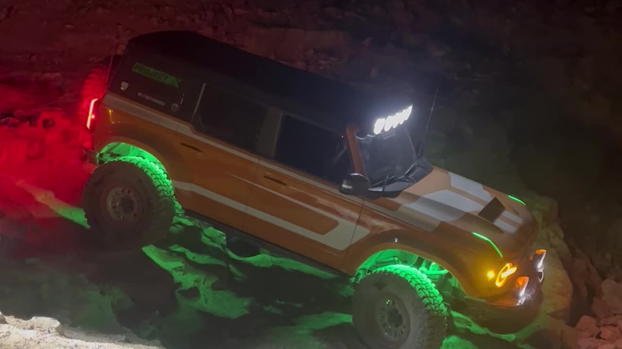 Bronco Slides Down Steep Rocks