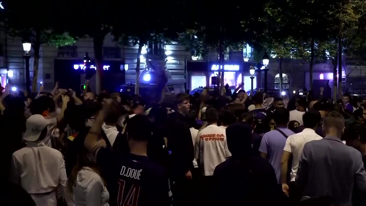 Two dead as celebrations in Paris turn into clashes after PSG win