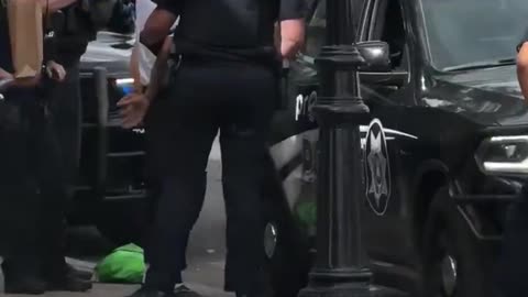 Video shows man with weapons being detained near scene of Utah University shooting