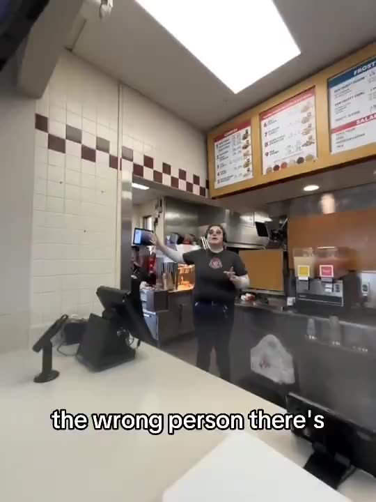 Wendys employee loses it and begins hitting herself in the head repeatedly after