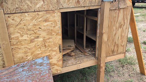 installing the door on the chicken coop
