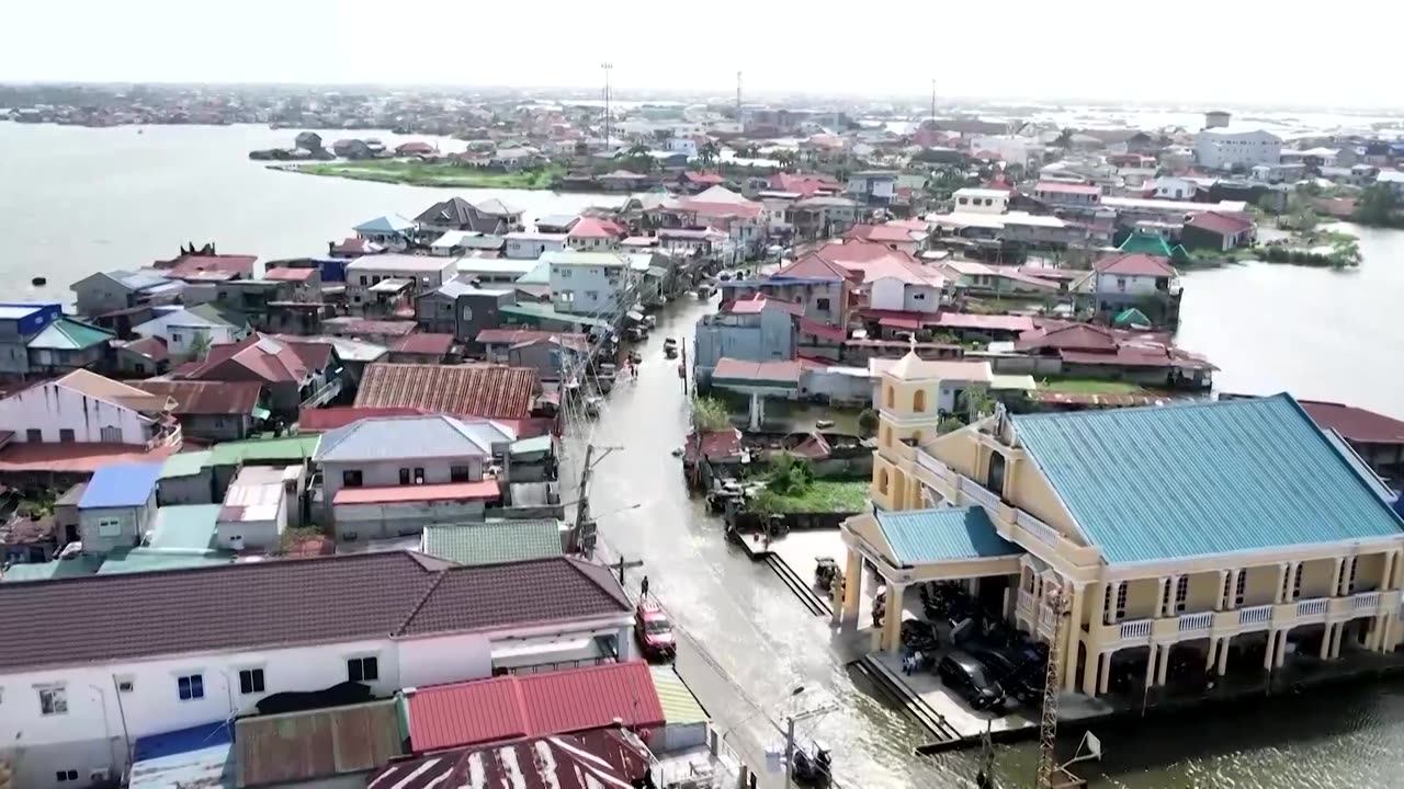 Drone shots show flooding in Philippine town after Typhoon Fung-wong