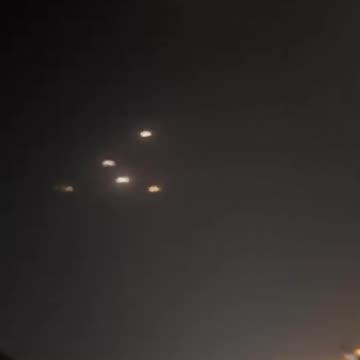 US Service members in Qatar reacting to interceptors taking down Iranian missles.