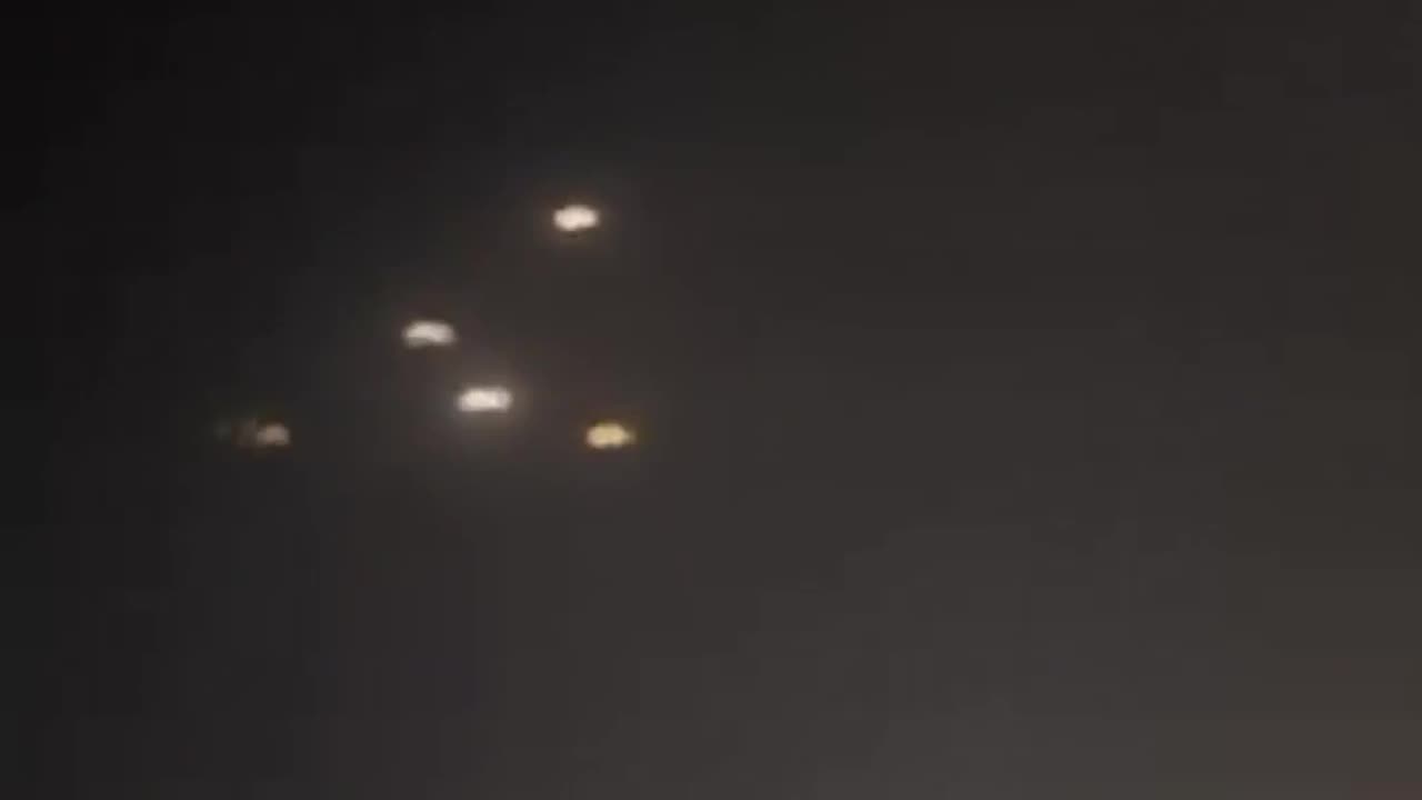 US Service members in Qatar reacting to interceptors taking down Iranian missles.