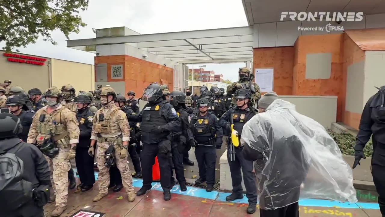 First arrest in front of the Portland ICE building Saturday afternoon. Female activist