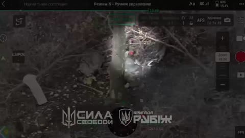 Russian Soldier Lights a Cigarette Off Former Comrade