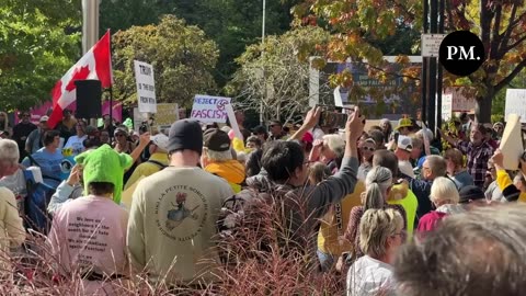 Protesters chant "No Trump, no KKK, no fascist USA!" in Toronto, Canada