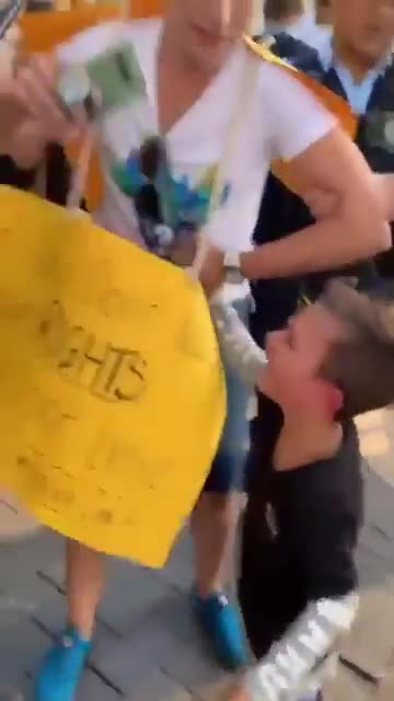 Australian Police arresting a Mother for being outside during Covid Lockdown in front of her child